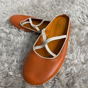 Elegant Orange Flats with Cream Accents